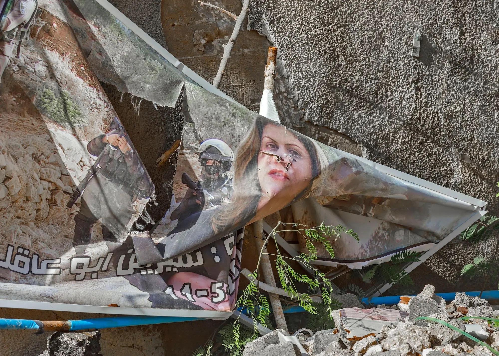 Rehab Nazzal, photograph of a banner in memory of Shireen Abu Akleh (placed where she was assassinated) destroyed by the Israeli Occupation Forces, Jenin Refugee Camp, 2024